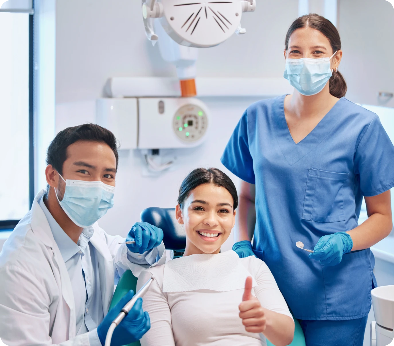 Happy patient in dental clinic