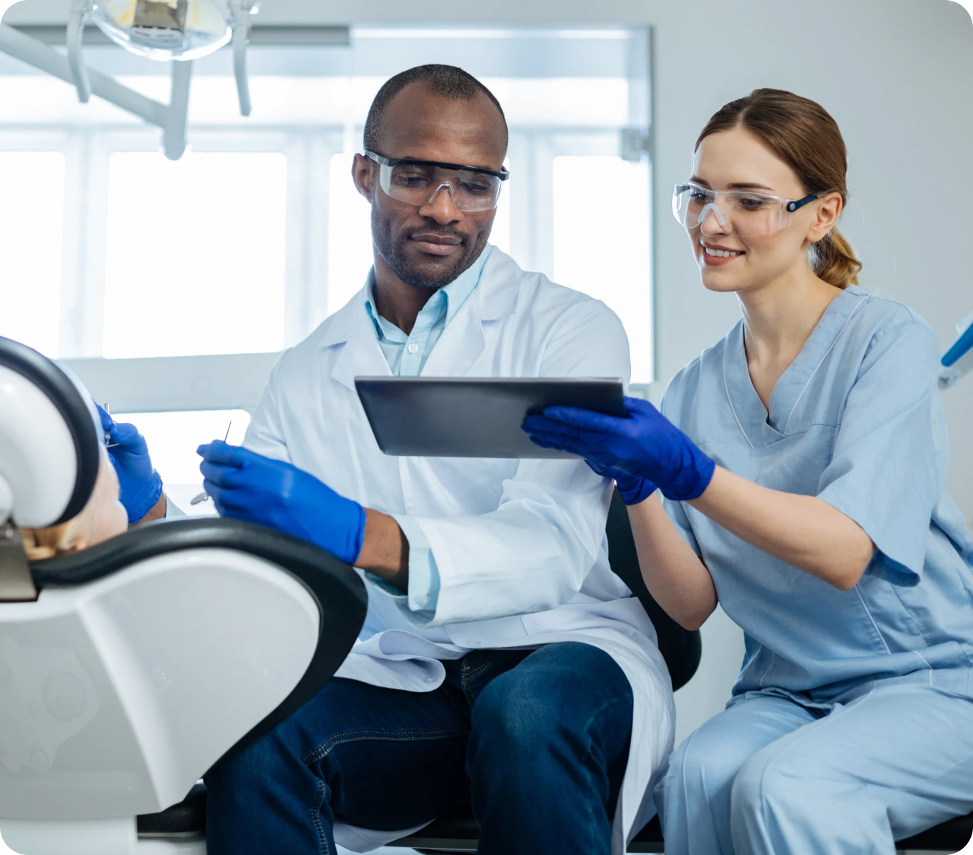 Dental professionals discussing treatment plan