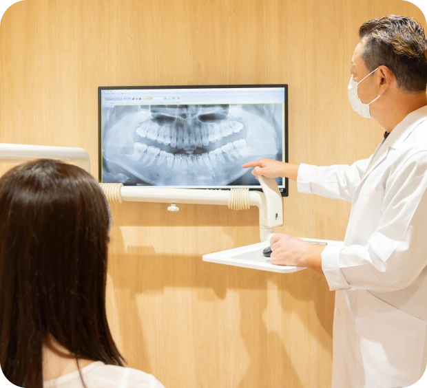 Dental consultation with X-ray display